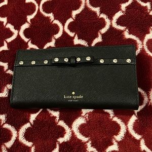 Authentic Gently used Kate Spade Wallet with rhinestone detail & bow